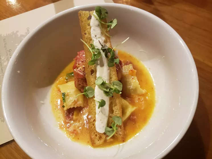 A Pat LaFrieda dry-aged meatball with stewed Steverino tomatoes at Oak at Fourteenth. - LINNEA COVINGTON