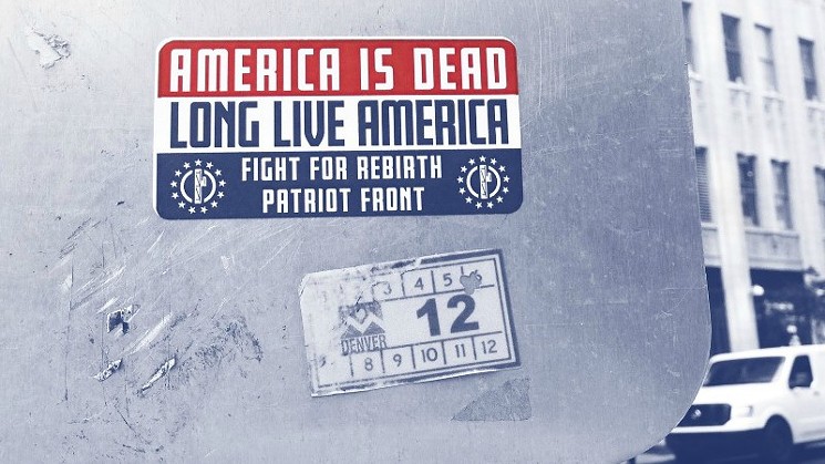 A Patriot Front sticker on a Denver street, as seen in a photo tweeted by the group in recent weeks. - @PATRIOTFRONT_