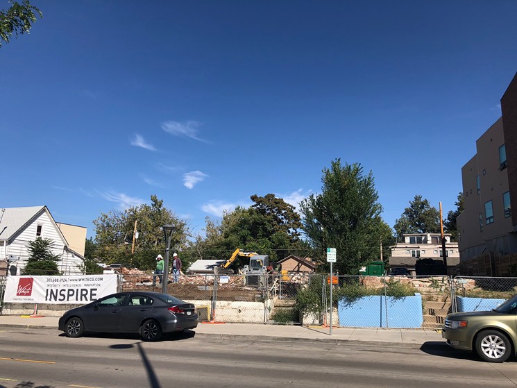 Three homes were demolished here within the past week. A mixed-use development with ground-floor retail space and condos above will rise in their place. - PAIGE YOWELL