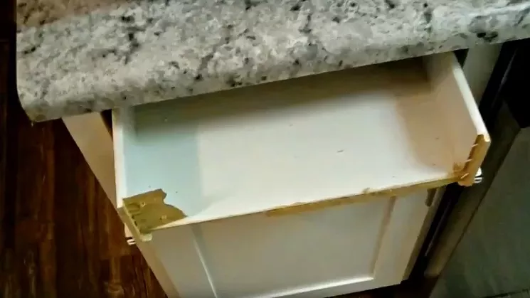 A damaged drawer in the apartment where Gieger and her two daughters moved while repairs were being made at their apartment. - COURTESY OF KERRY GIEGER