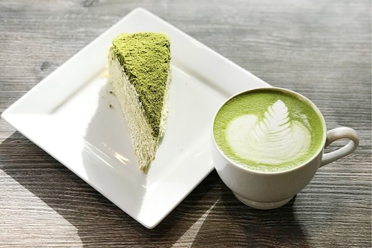 Matcha crepe cake and latte highlight the Khos' Asian heritage. - COURTESY DOPPIO