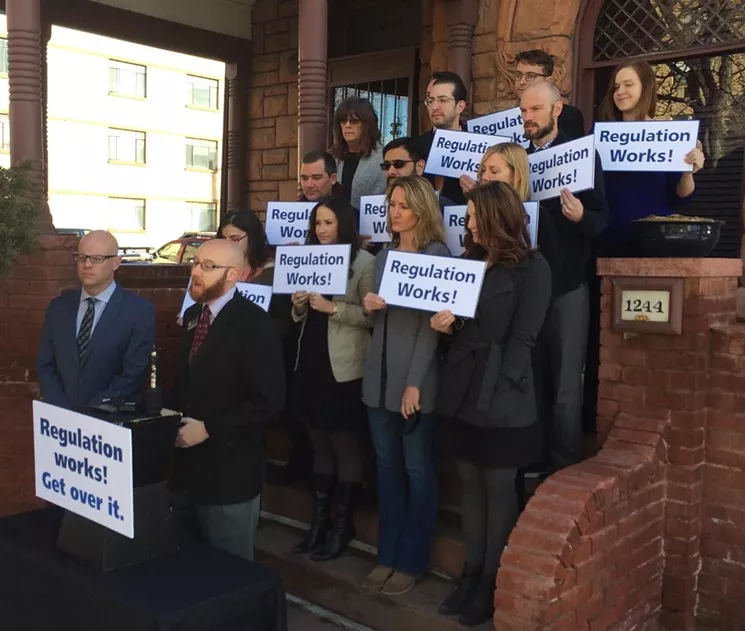 Representative Jonathan Singer was among the speakers at a 2015 press conference by marijuana regulation supporters that was spurred by the suits. - COURTESY OF THE MARIJUANA POLICY PROJECT