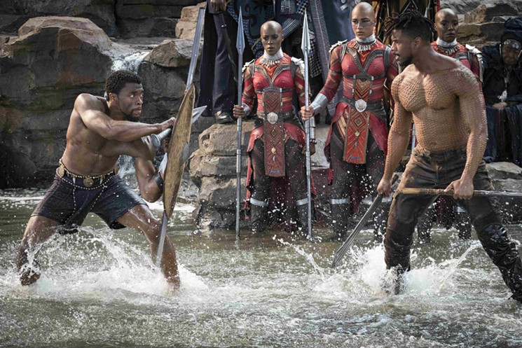 Chadwick Boseman (left) and Michael B. Jordan led a predominantly black cast in Ryan Coogler's rousing Black Panther. - COURTESY OF WALT DISNEY PICTURES