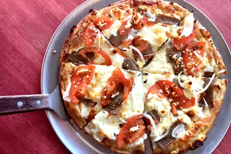 The Athenian at Papou's has tzatziki for sauce, but you can also get traditional red sauce loaded with herbs. - MARK ANTONATION