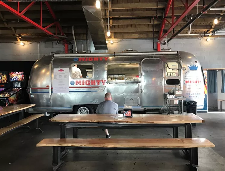 Denver Beer Co.'s Arvada location teamed up with a restaurant operator to open a food truck inside the brewery's walls. - JONATHAN SHIKES