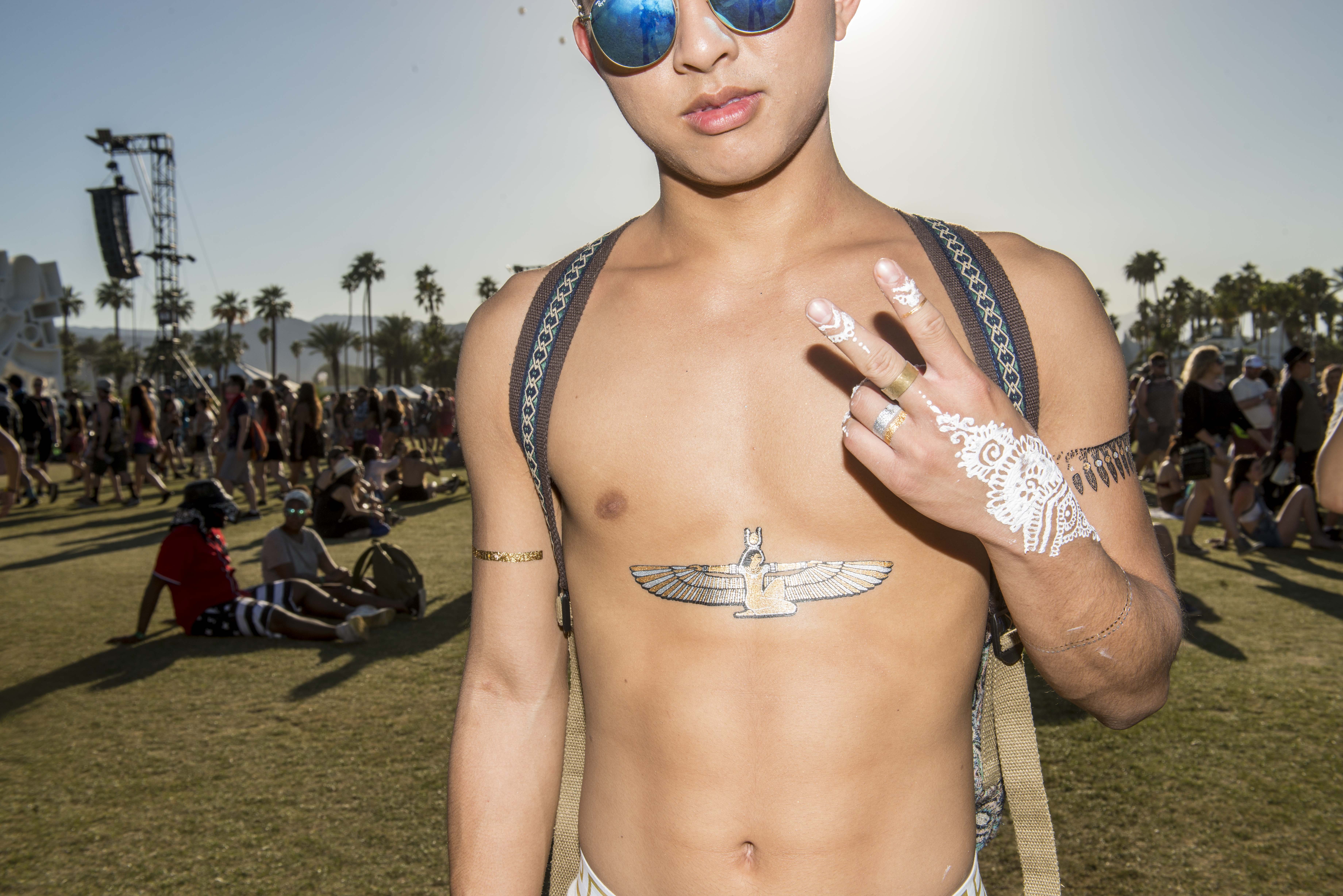 This guy flaunts his flash tattoos at Coachella. - SHANE LOPES