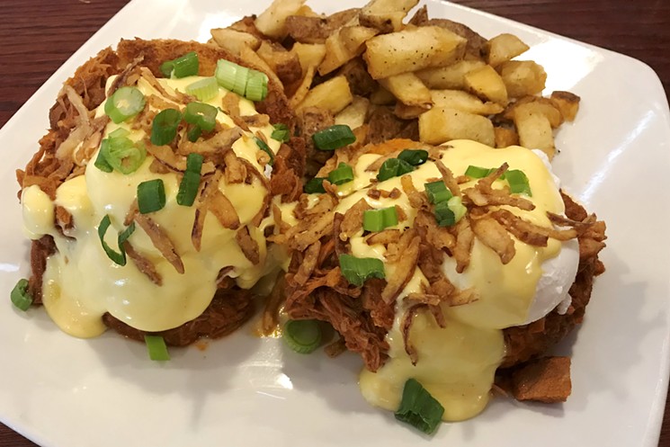 Carne adovada Benedict on a biscuit. - BRIDGET WOOD