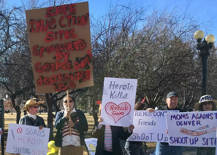 Demonstrators against supervised use sites made their presence known during the Marade on January 21. - CHRIS WALKER