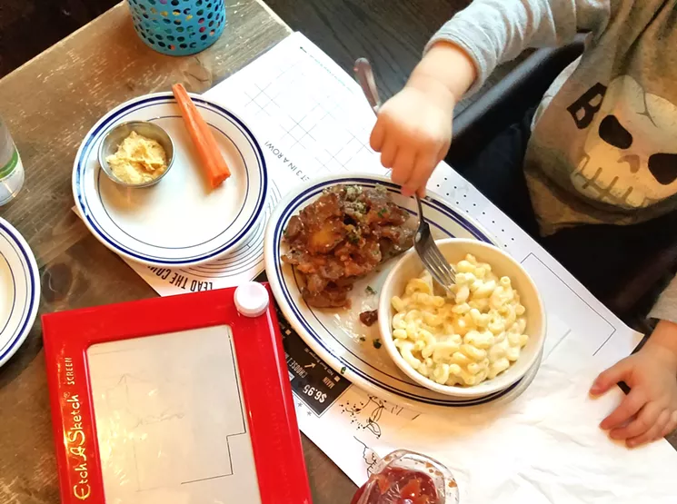 Etch A Sketch and macaroni and cheese — a great kid combo at Next Door American Eatery at Union Station. - LINNEA COVINGTON