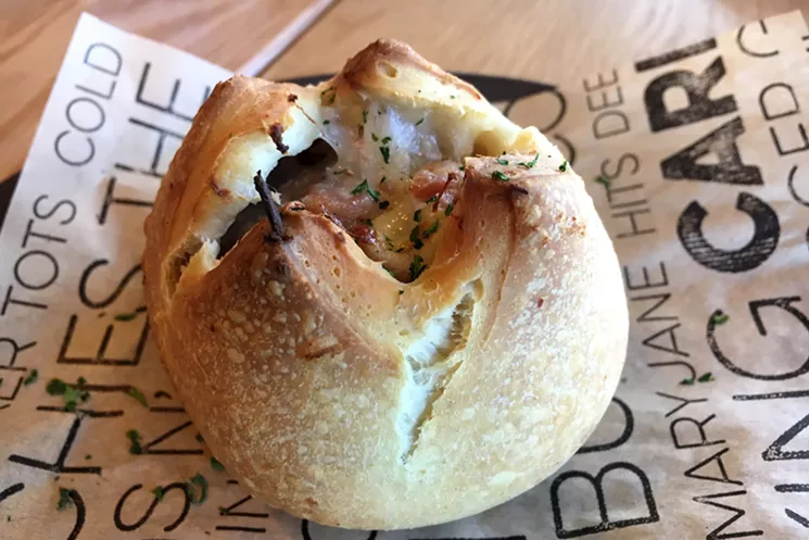 Buns stuffed with jamón and Manchego cheese are inspired by the buns at Dead Battery Club. - MARK ANTONATION