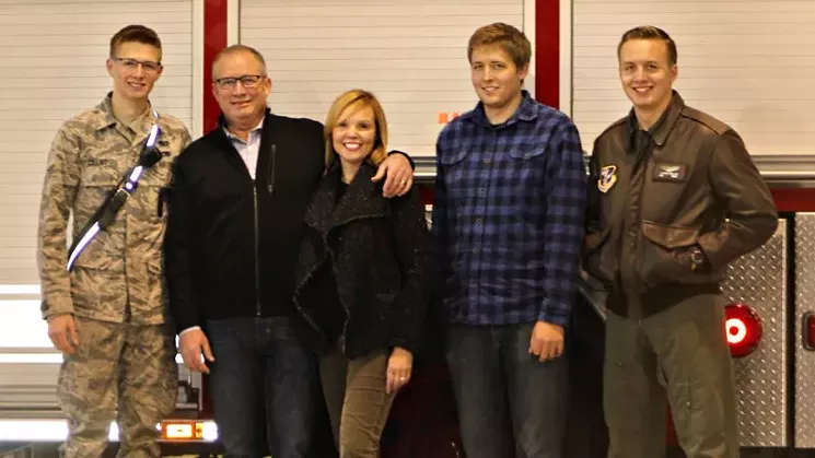 Andrew Collins with wife, Jill, and his three sons, all of whom are members of the United States Air Force. They include Drew, who is starting basic training at the end of the month to be an ATC contoller, firefighter Charlie and C-17 loadmaster Connor. - COURTESY OF ANDREW COLLINS