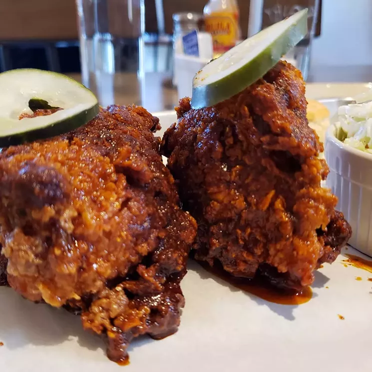 Chicken and pickles at Grind in Cherry Creek, an unlikely location for Nashville flavor. - ADRIAN MILLER