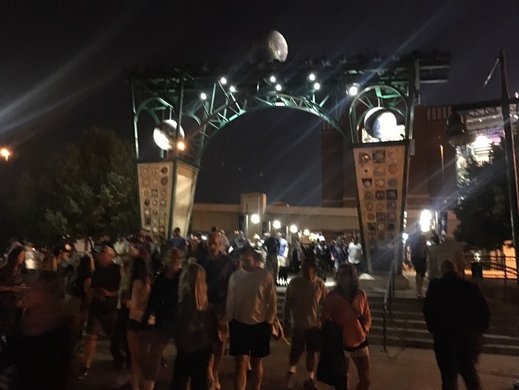 Fans pass by "The Evolution of the Ball" in July 2018. - WESTWORD