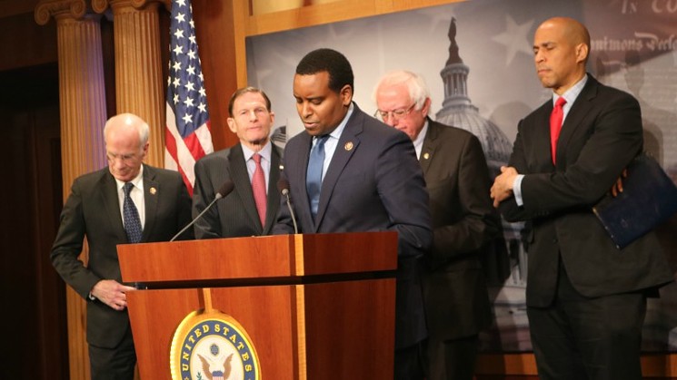 Joe Neguse at a January press conference for the Prescription Drug Price Relief Act, joined by (left to right) Representative Peter Welch and senators Richard Blumenthal, Bernie Sanders and Cory Booker. - NEGUSE.HOUSE.GOV