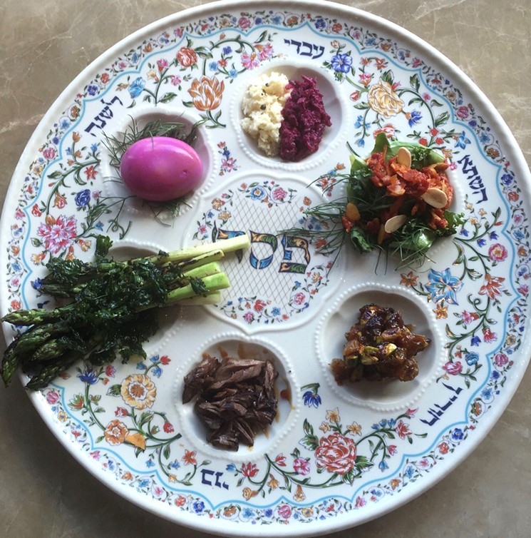 A traditional seder plate holds a shank bone, egg, vegetable, bitter herbs and charoset. - COURTESY OF SAFTA