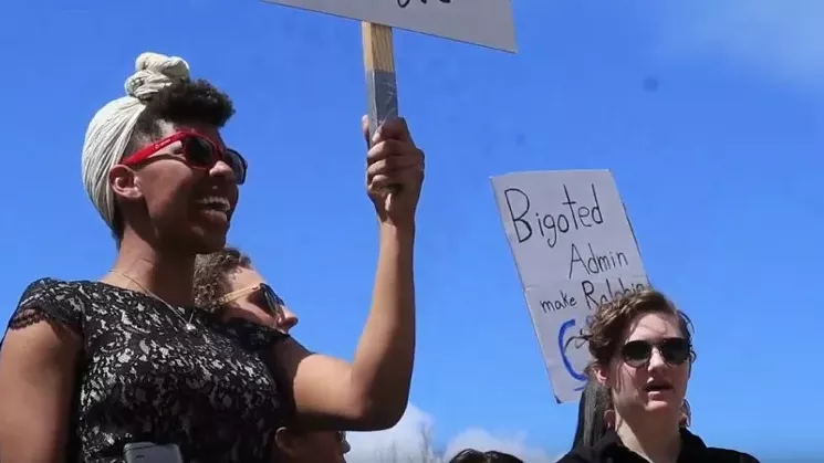 Participants in an April 15 rally against naming Mark Kennedy as the sole finalist for the position of University of Colorado president. - CU INDEPENDENT VIA YOUTUBE