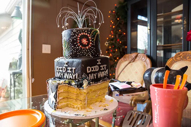Lyrics from the song “My Way,” which Lee said encapsulated her decision, adorned her party cake. - DANIELLE LIRETTE