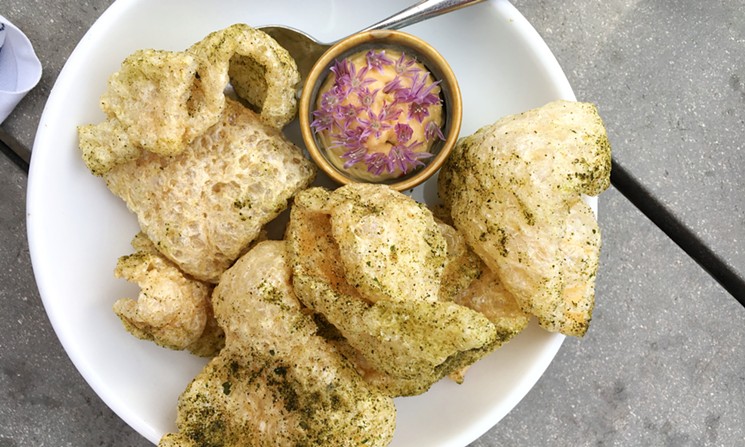 Pork rinds with green chile powder and pimento cheese. - MARK ANTONATION