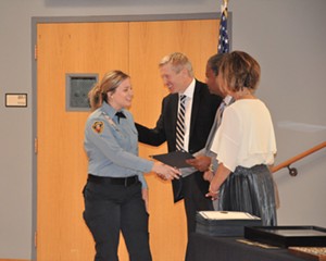 Dean Williams shakes hands with 143 new corrections employees. - COURTESY OF DEPARTMENT OF CORRECTIONS