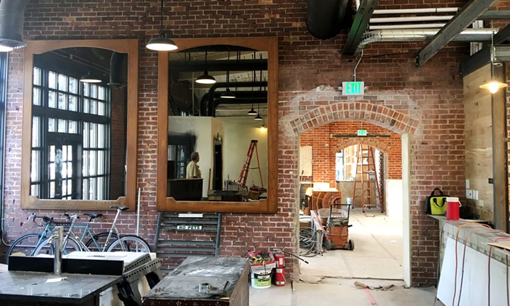 Looking from the Logan Street dining room into the Carboy retail shop. - MARK ANTONATION