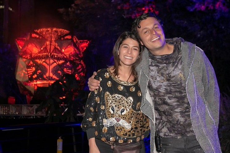 Catalina Pulido and Leo Vilar of Sonic Design Studio pose with Jaguara at Burning Man 2018. - COURTESY OF SONIC DESIGN