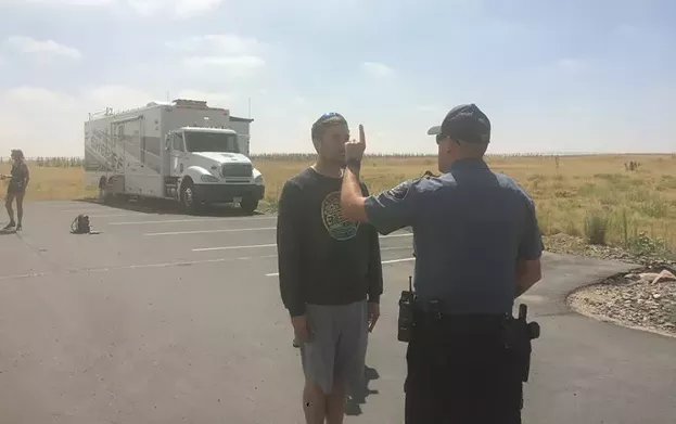 A Colorado county sheriff measures a driver's impairment levels during a 2018 driving experiment that measures the skills of alcohol and cannabis users. - THOMAS MITCHELL