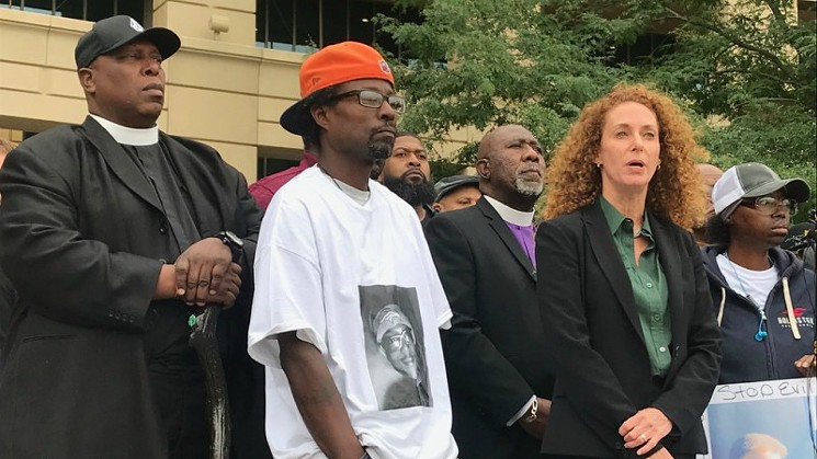Attorney Mari Newman spoke alongside Elijah McClain's family members and representatives of the Greater Metro Denver Ministerial Alliance, among others. - MICHAEL ROBERTS