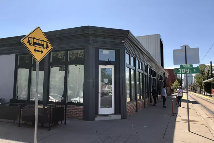 The purple door is gone, but a new glass door welcomes customers to Queen City. - COURTESY QUEEN CITY COLLECTIVE COFFEE