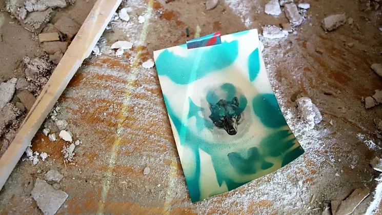 A stenciled version of Ernest Thompson Seton's drawing of Lobo in the rubble of the Hut. - COURTESY OF WE WERE WILD