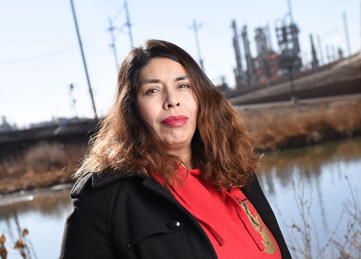 Lucy Molina, who lives less than a mile from the Suncor refinery in Commerce City, says her family started experiencing health effects soon after moving to their new home. - ANTHONY CAMERA
