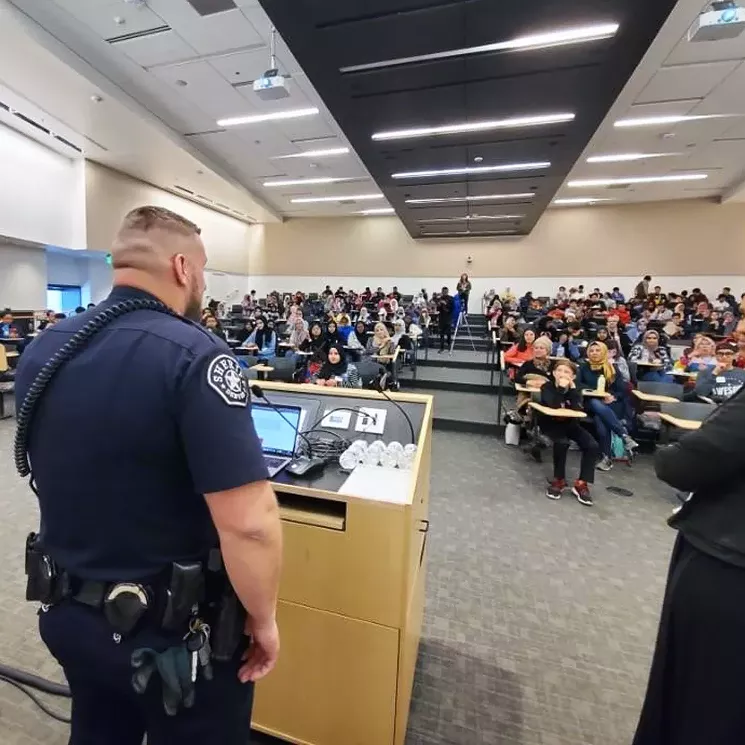 Melis Ibisevic speaking to Muslim youth about working in law enforcement. - COURTESY OF MELIS IBISEVIC