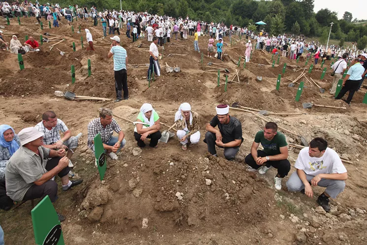 Junuz Ibisevic's body was found in a mass grave, like this one near Srebrenica. - SEAN GALLUP/GETTY STAFF