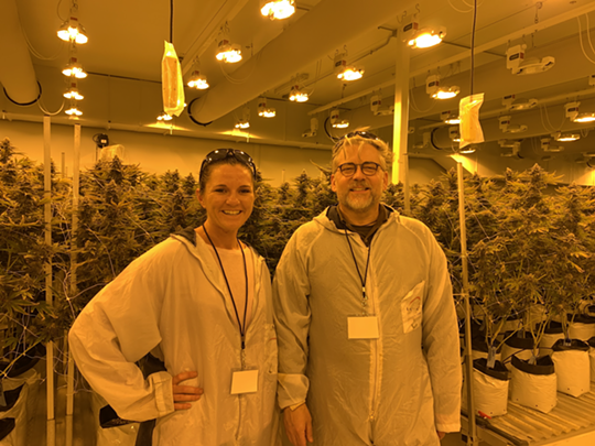 CDPHE researchers Kaitlin Urso and Dr. Daniel Bon in front of their study subjects. - COURTESY OF CDPHE