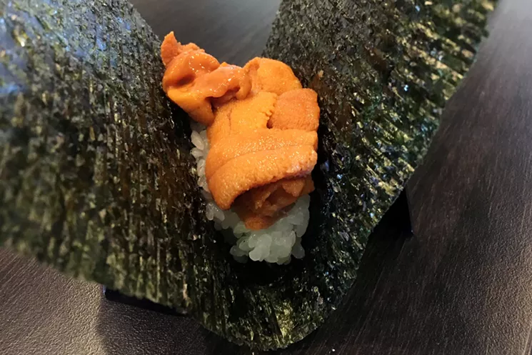 Tai Tai's uni (sea urchin) hand roll, which chef Wayne Conwell calls "Japanese ice cream." - MARK ANTONATION