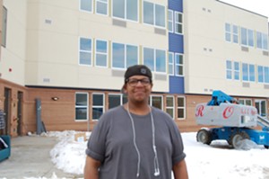 Christopher Hampton helped moved furniture into PATH, the affordable-housing complex that ended his four-and-a-half-year experience with homelessness. - SARA FLEMING