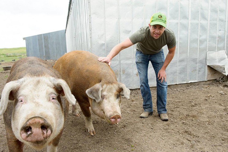 Craig Taber on a pig farm in Wyoming. - LOCAVORE DELIVERY