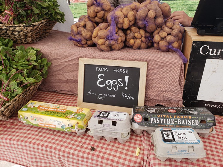 Goods from Cure Organic Farm at last year's Boulder County Farmers' Market in Boulder. - LINNEA COVINGTON