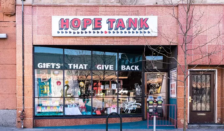 Imagine Hope Tank boarded up, with a new mural applied to brighten the picture. - COURTESY OF ERKA RIGHTER
