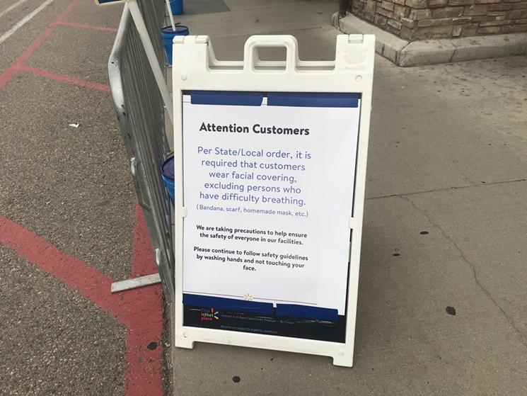 A sign on display outside the Walmart in Highlands Ranch. - PHOTO BY MICHAEL ROBERTS