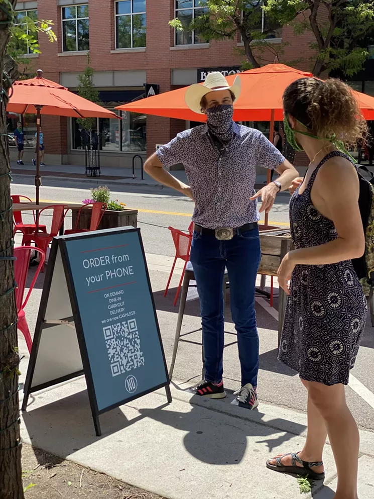 Even masked, Kimbal Musk is recognizable because of his straw cowboy hat. - COURTESY OF THE KITCHEN RESTAURANT GROUP