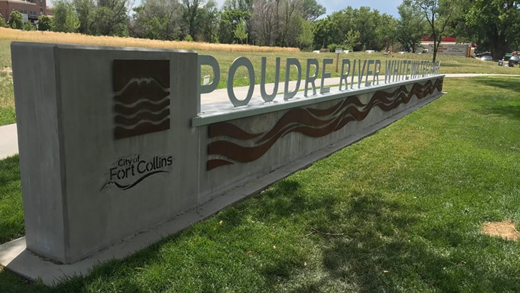 The sign at the entrance to Poudre River Whitewater Park. - PHOTO BY MICHAEL ROBERTS