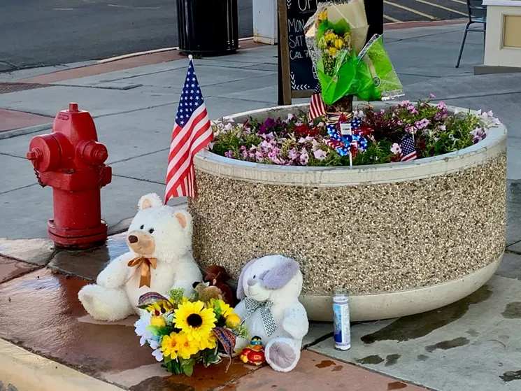 Alamosa residents left tokens of the concern for Danny Pruitt after the shooting, uncertain if he would survive. - SUSAN GREENE