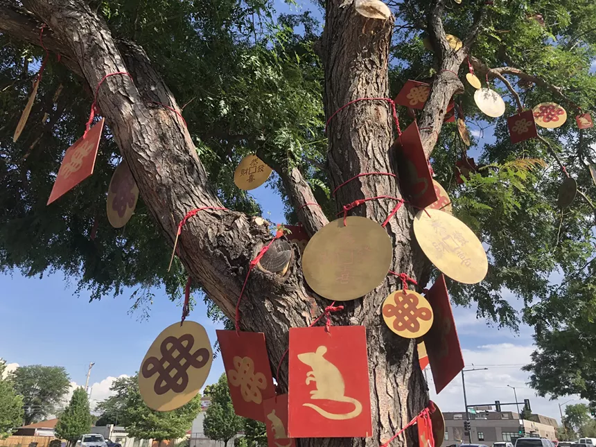 Munet created stencils so that youth participants could easily decorate ornaments for the tree. - CLEO MIRZA
