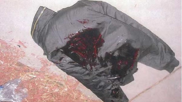 The jacket worn by Alexander Landau  as seen after he was beaten by Denver police officers in 2011. - FILE PHOTO
