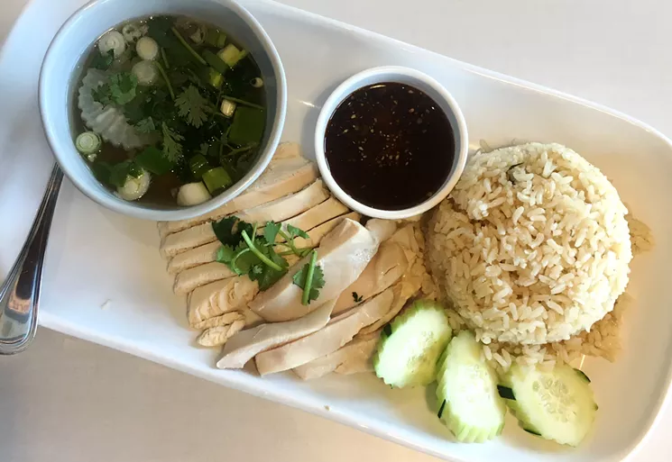 Kaw mun kai is an exercise in simplicity, with moist chicken, jasmine rice, a chile-ginger dipping sauce and a side of soup. - MARK ANTONATION