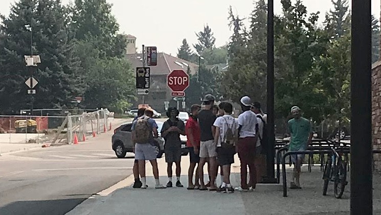 Mask usage was strong on the CU Boulder campus on August 22. Social distancing? Not so much. - PHOTO BY MICHAEL ROBERTS