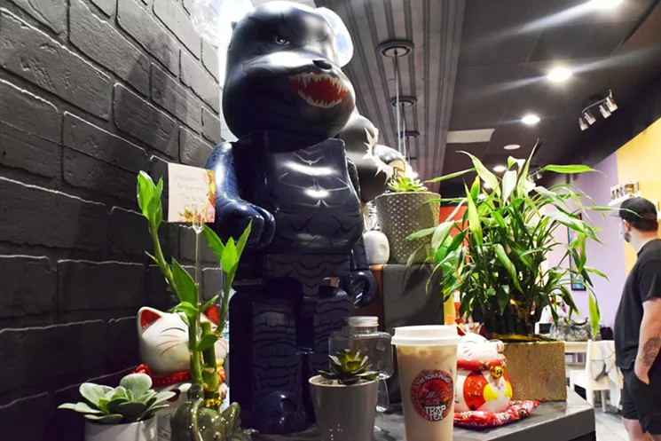 Be@rbrick figurines and other merchandise fill the counters at Trap Tea. - CLAIRE DUNCOMBE