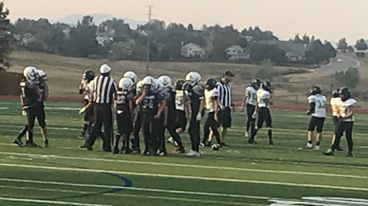 Referees were unmasked during the September 19 youth football game at Chatfield High School. - PHOTO BY MICHAEL ROBERTS