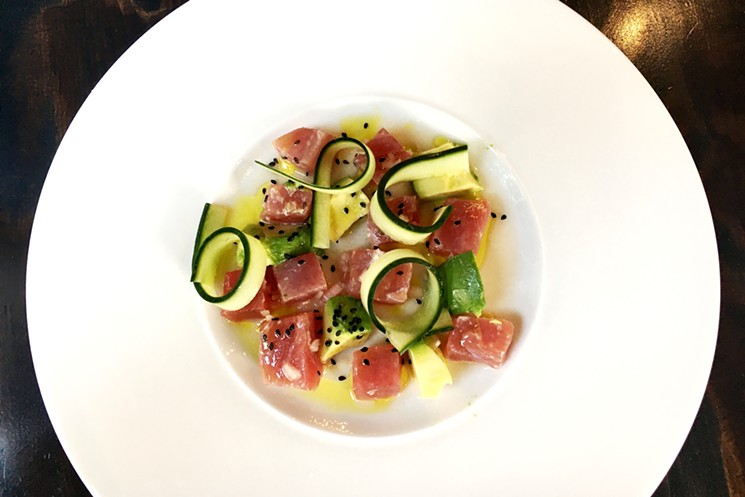Manzo's tuna crudo has elements of Hawaiian poke. - MARK ANTONATION