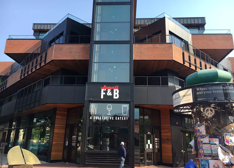 Avanti Boulder's front entrance, with the glass elevator to the fourth-floor bar and pizzeria. - MARK ANTONATION